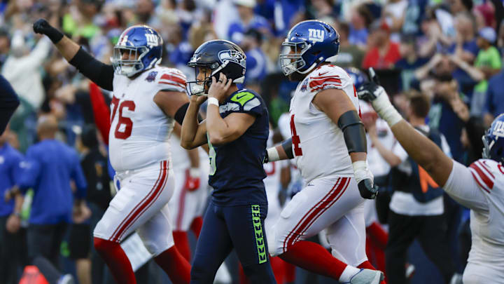 Oct 6, 2024; Seattle, Washington, USA; Seattle Seahawks place kicker Jason Myers (5) reacts after a blocked field goal was returned by the New York Giants for a touchdown  during the fourth quarter at Lumen Field. Mandatory Credit: Joe Nicholson-Imagn Images