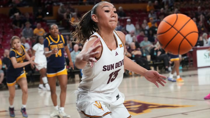 ASU Sun Devils forward Last-Tear Poa (13) chases down a loose ball against the Coppin State Bald Eagles at Desert Financial Arena on Nov. 3, 2025. ASU Sun Devils forward Last-Tear Poa (13) chases down a loose ball against the Coppin State Bald Eagles at Desert Financial Arena on Nov. 3, 2025.
