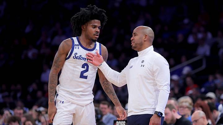 Mar 12, 2026; New York, NY, USA; Seton Hall basketball head coach Shaheen Holloway talks to guard Tajuan Simpkins (2) during the second half against the Creighton Bluejays at Madison Square Garden.