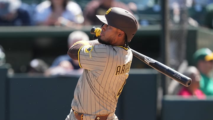 Apr 9, 2025; West Sacramento, California, USA; San Diego Padres first baseman Luis Arraez (4) bats against the Athletics during the fourth inning at Sutter Health Park. Mandatory Credit: Darren Yamashita-Imagn Images