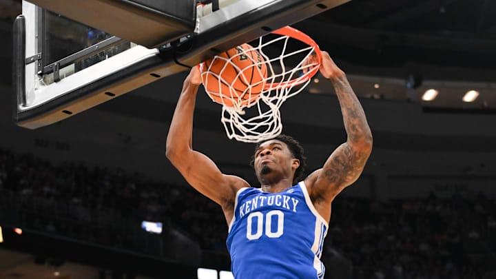 Mar 22, 2026; St. Louis, MO, USA; Kentucky Wildcats guard Otega Oweh (00) dunks during the second half against the Iowa State Cyclones during a second round game of the men's 2026 NCAA Tournament at Enterprise Center. Mandatory Credit: Jeff Curry-Imagn Images