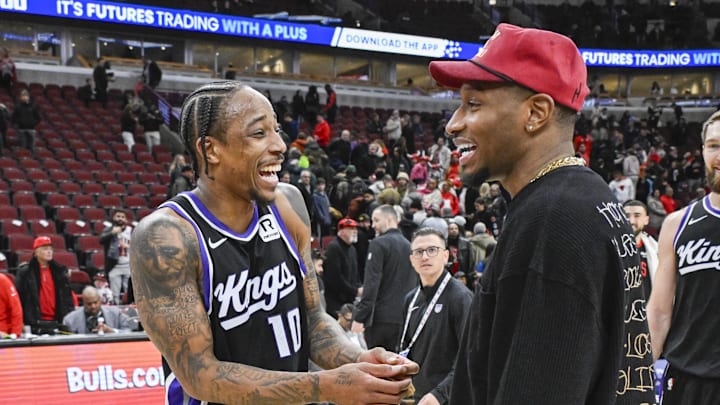 Jan 12, 2025; Chicago, Illinois, USA;  Sacramento Kings forward DeMar DeRozan (10) hugs former teammate Chicago Bulls forward Torrey Craig (13), after the game at the United Center. Mandatory Credit: Matt Marton-Imagn Images