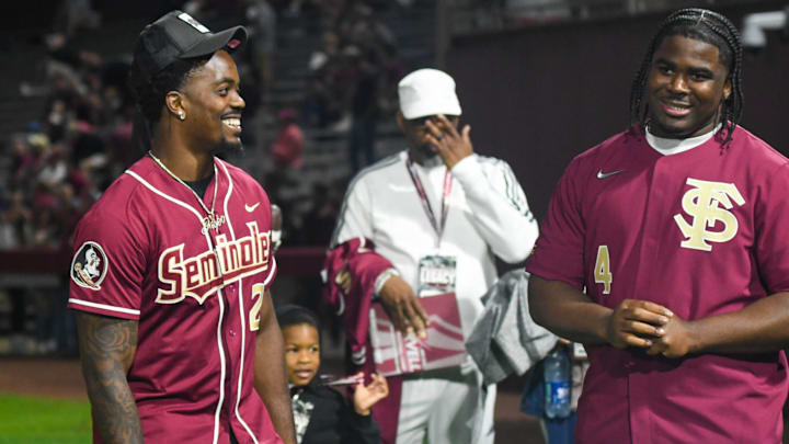 Former Florida State running back Jashaun Corbin (left) and defensive lineman Keir Thomas take in
