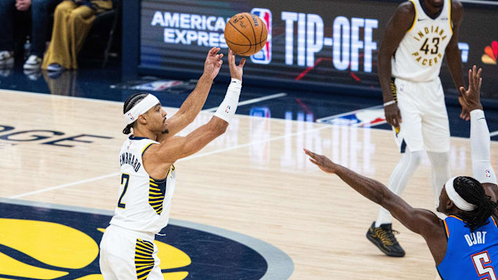 Oct 23, 2025; Indianapolis, Indiana, USA; Indiana Pacers guard Andrew Nembhard (2) shoots the ball while Oklahoma City Thunder guard Luguentz Dort (5) defends in the first half at Gainbridge Fieldhouse. Mandatory Credit: Trevor Ruszkowski-Imagn Images Oct 23, 2025; Indianapolis, Indiana, USA; Indiana Pacers guard Andrew Nembhard (2) shoots the ball while Oklahoma City Thunder guard Luguentz Dort (5) defends in the first half at Gainbridge Fieldhouse. Mandatory Credit: Trevor Ruszkowski-Imagn Images