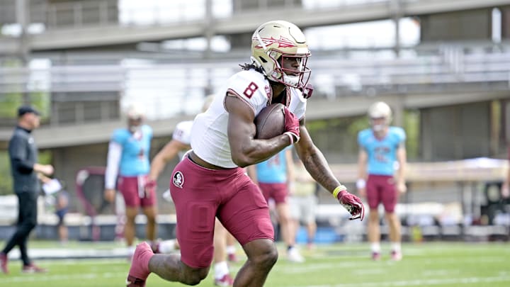 Apr 20, 2024; Tallahassee, Florida, USA; Florida State Seminoles wide receiver Hykeem Williams (8) runs the ball during the Spring Showcase at Doak S. Campbell Stadium. Mandatory Credit: Melina Myers-Imagn Images
