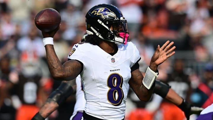 Oct 27, 2024; Cleveland, Ohio, USA; Baltimore Ravens quarterback Lamar Jackson (8) throws a pass during the first half against the Cleveland Browns at Huntington Bank Field. Mandatory Credit: Ken Blaze-Imagn Images