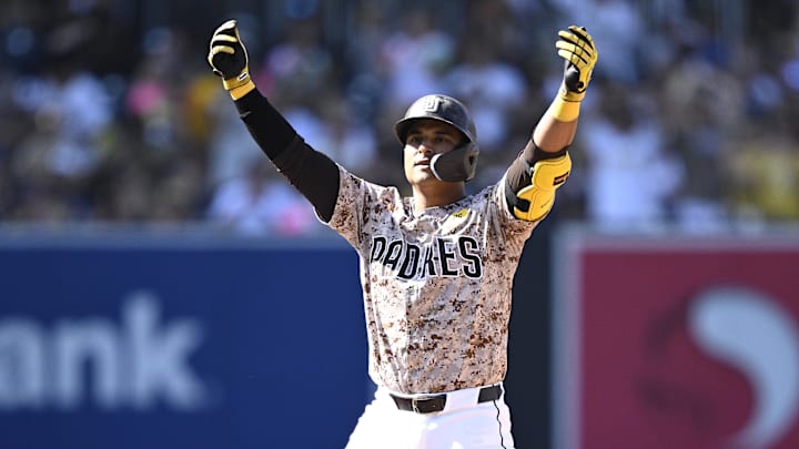 Sep 22, 2024; San Diego, California, USA; San Diego Padres first baseman Donovan Solano (39) celebrates after hitting a double against the Chicago White Sox during the eighth inning at Petco Park. Mandatory Credit: Orlando Ramirez-Imagn Images Sep 22, 2024; San Diego, California, USA; San Diego Padres first baseman Donovan Solano (39) celebrates after hitting a double against the Chicago White Sox during the eighth inning at Petco Park. Mandatory Credit: Orlando Ramirez-Imagn Images