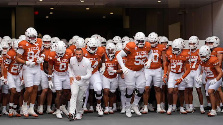 Sep 20, 2025; Austin, Texas, USA; Texas Longhorns head coach Steve Sarkisian leads his team on to the field before a game against the Sam Houston State Bearkats at Darrell K Royal-Texas Memorial Stadium. Mandatory Credit: Scott Wachter-Imagn Images