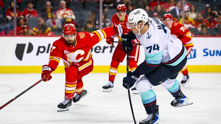 Oct 1, 2026; Calgary, Alberta, CAN; Seattle Kraken center Bobby McMann (74) shoots the puck against the Calgary Flames during the third period at Scotiabank Saddledome. Mandatory Credit: Sergei Belski-Imagn Images Oct 1, 2026; Calgary, Alberta, CAN; Seattle Kraken center Bobby McMann (74) shoots the puck against the Calgary Flames during the third period at Scotiabank Saddledome. Mandatory Credit: Sergei Belski-Imagn Images