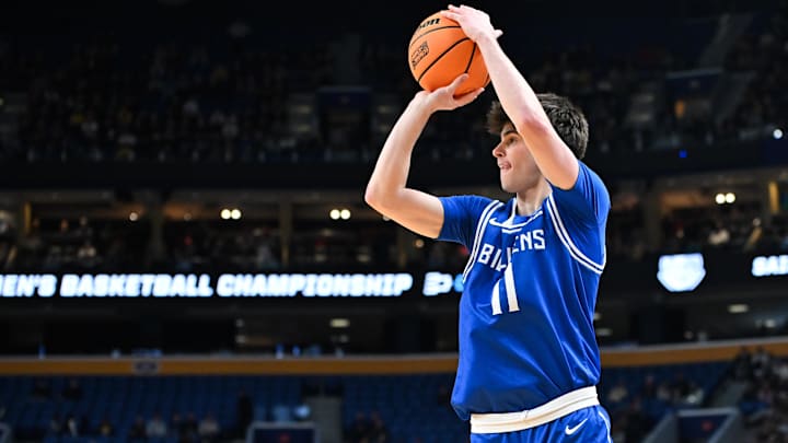 Mar 21, 2026; Buffalo, NY, USA; Saint Louis Billikens forward Brady Dunlap (11) shoots the ball in the first half against the Michigan Wolverines during a second round game of the men's 2026 NCAA Tournament at Keybank Center. Mandatory Credit: Mark Konezny-Imagn Images