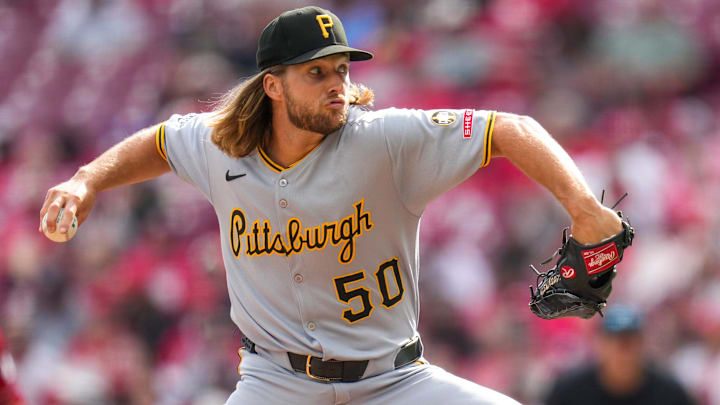 Pittsburgh Pirates relief pitcher Carmen Mlodzinski (50) throws a pitch in the seventh inning of the MLB National League game between the Cincinnati Reds and the Pittsburgh Pirates at Great American Ball Park in downtown Cincinnati on Thursday, Sept. 25, 2025. The Reds won, 2-1. Pittsburgh Pirates relief pitcher Carmen Mlodzinski (50) throws a pitch in the seventh inning of the MLB National League game between the Cincinnati Reds and the Pittsburgh Pirates at Great American Ball Park in downtown Cincinnati on Thursday, Sept. 25, 2025. The Reds won, 2-1.