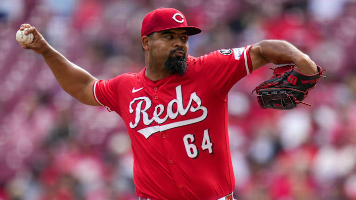 Cincinnati Reds relief pitcher Tony Santillan (64) throws a pitch in the eighth inning of the MLB National League game between the Cincinnati Reds and the Pittsburgh Pirates at Great American Ball Park in downtown Cincinnati on Thursday, Sept. 25, 2025. The Reds won, 2-1. Cincinnati Reds relief pitcher Tony Santillan (64) throws a pitch in the eighth inning of the MLB National League game between the Cincinnati Reds and the Pittsburgh Pirates at Great American Ball Park in downtown Cincinnati on Thursday, Sept. 25, 2025. The Reds won, 2-1.