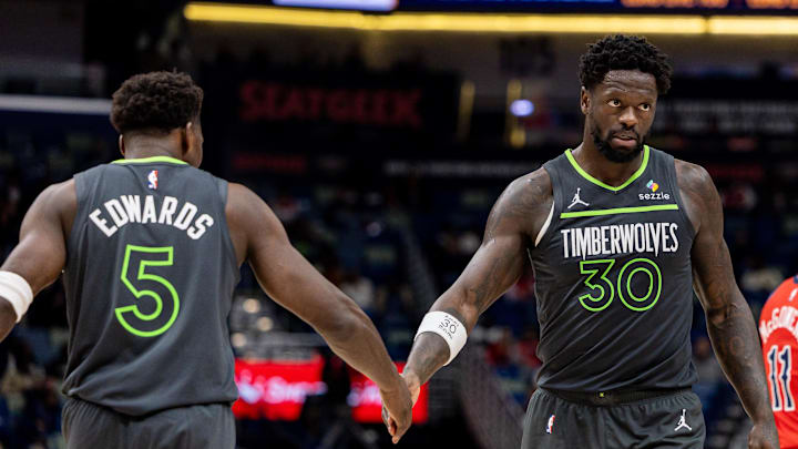 Dec 4, 2025; New Orleans, Louisiana, USA; Minnesota Timberwolves forward/center Julius Randle (30) claps hands with guard Anthony Edwards (5) after a play against the New Orleans Pelicans during the second half at Smoothie King Center. Mandatory Credit: Stephen Lew-Imagn Images