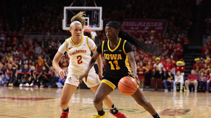 Dec 10, 2025; Ames, Iowa, USA; Iowa State Cyclones Arianna Jackson (2) defends Iowa Hawkeyes Chazadi 'chit-Chat' Wright (11) during the second half at James H. Hilton Coliseum. Mandatory Credit: Reese Strickland-Imagn Images Dec 10, 2025; Ames, Iowa, USA; Iowa State Cyclones Arianna Jackson (2) defends Iowa Hawkeyes Chazadi 'chit-Chat' Wright (11) during the second half at James H. Hilton Coliseum. Mandatory Credit: Reese Strickland-Imagn Images