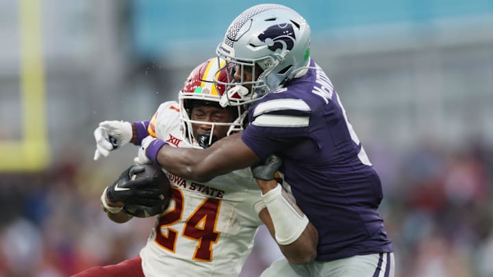 Aug 23, 2025; Dublin, IRELAND; Iowa State player Abu Sama III is tackled by Donovan McIntosh of of Kansas State during the Aer Lingus Classic between Iowa State and Kansas State at Aviva Stadium. Mandatory Credit: Laszlo Geczo/INPHO via Imagn Images