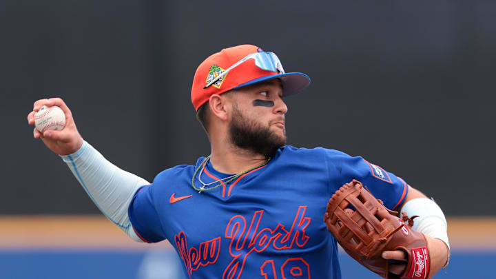 Feb 21, 2026; Port St. Lucie, Florida, USA; New York Mets third baseman Bo Bichette (19) throws to first base but cannot retire Miami Marlins third baseman Connor Norby (not pictured) during the fourth inning at Clover Park. Mandatory Credit: Sam Navarro-Imagn Images