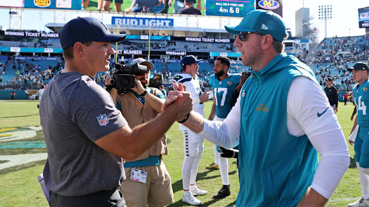 Oct 12, 2025; Jacksonville, Florida, USA; Jacksonville Jaguars head coach Liam Coen and Seattle Seahawks head coach Mike MacDonald react after the game at EverBank Stadium. Mandatory Credit: Morgan Tencza-Imagn Images