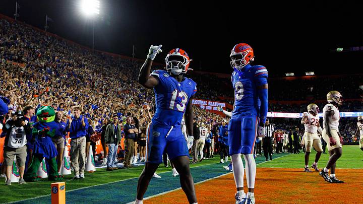 Nov 29, 2025; Gainesville, Florida, USA; Florida Gators running back Jadan Baugh (13) gestures toward the crowd against the Florida State Seminoles during the second half at Ben Hill Griffin Stadium. Mandatory Credit: Matt Pendleton-Imagn Images