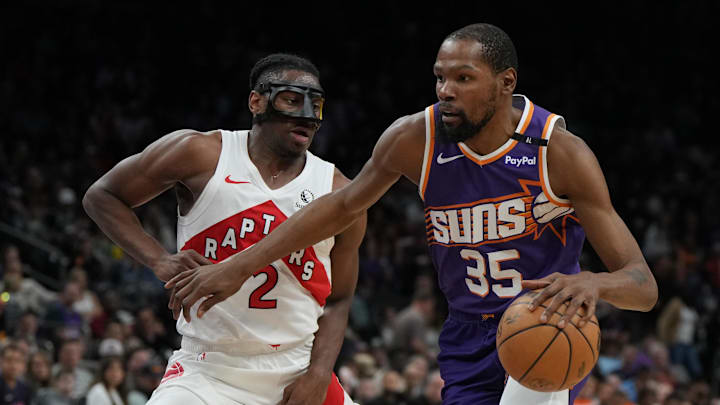 Mar 17, 2025; Phoenix, Arizona, USA; Phoenix Suns forward Kevin Durant (35) shields the ball from Toronto Raptors forward Jonathan Mogbo (2) in the second half at Footprint Center. Mandatory Credit: Rick Scuteri-Imagn Images Mar 17, 2025; Phoenix, Arizona, USA; Phoenix Suns forward Kevin Durant (35) shields the ball from Toronto Raptors forward Jonathan Mogbo (2) in the second half at Footprint Center. Mandatory Credit: Rick Scuteri-Imagn Images