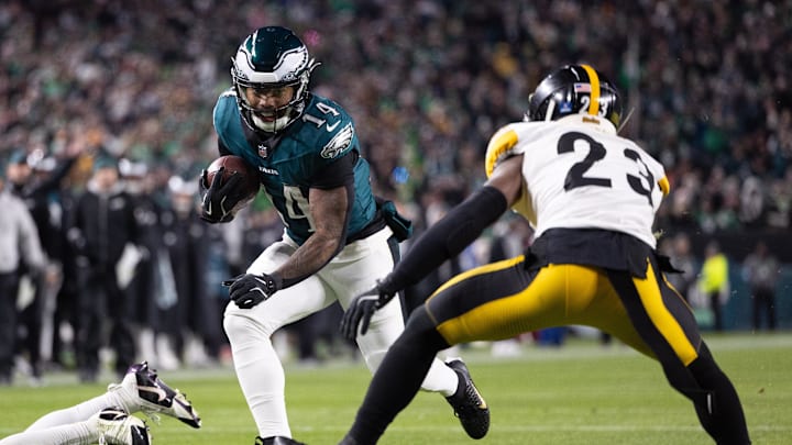 Dec 15, 2024; Philadelphia, Pennsylvania, USA; Philadelphia Eagles running back Kenneth Gainwell (14) runs with the ball against Pittsburgh Steelers safety Damontae Kazee (23) during the second quarter at Lincoln Financial Field. Mandatory Credit: Bill Streicher-Imagn Images Dec 15, 2024; Philadelphia, Pennsylvania, USA; Philadelphia Eagles running back Kenneth Gainwell (14) runs with the ball against Pittsburgh Steelers safety Damontae Kazee (23) during the second quarter at Lincoln Financial Field. Mandatory Credit: Bill Streicher-Imagn Images
