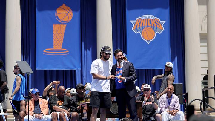 New York City mayor Zohran Mamdani (right) hands a key to the city of New York Knicks guard Jalen Brunson