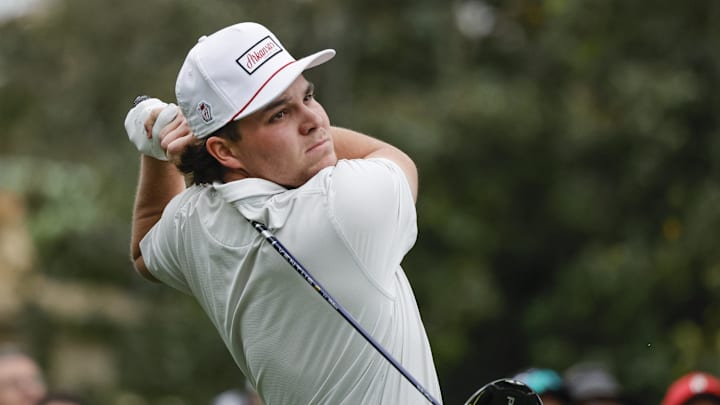 John Daly II plays his shot from the first tee during the PNC Championship at The Ritz-Carlton Golf Club. 