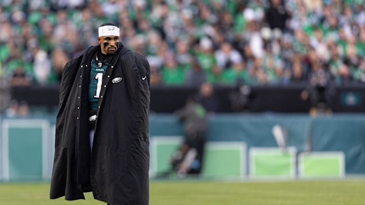 Dec 8, 2024; Philadelphia, Pennsylvania, USA;  Philadelphia Eagles quarterback Jalen Hurts (1) looks on against the Carolina Panthers at Lincoln Financial Field. Mandatory Credit: Bill Streicher-Imagn Images