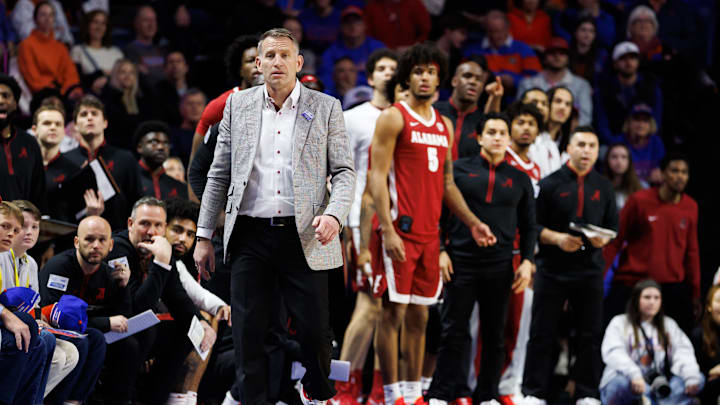 Feb 1, 2026; Gainesville, Florida, USA; Alabama Crimson Tide head coach Nate Oats walks the sideline against the Florida Gators during the first half at Exactech Arena at the Stephen C. O'Connell Center.
