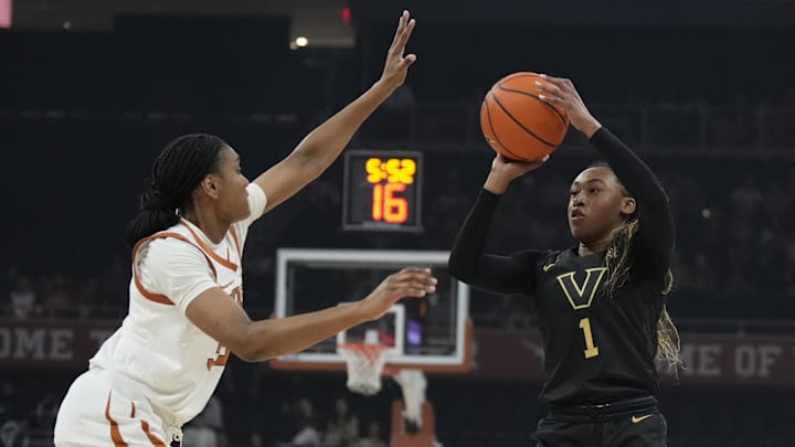 Feb 6, 2025; Austin, Texas, USA; Vanderbilt Commodores guard Mikayla Blakes (1) shoots over Texas Longhorns forward Madison Booker (35) during the first half at Moody Center. Mandatory Credit: Scott Wachter-Imagn Images