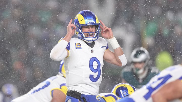 Jan 19, 2025; Philadelphia, Pennsylvania, USA; Los Angeles Rams quarterback Matthew Stafford (9) calls a play from the line of scrimmage in the third quarter against the Philadelphia Eagles in a 2025 NFC divisional round game at Lincoln Financial Field. Mandatory Credit: Bill Streicher-Imagn Images