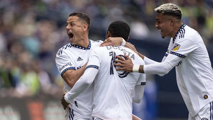 Mar 12, 2022; Seattle, Washington, USA; LA Galaxy forward Chichirito (14), left, midfielder Douglas