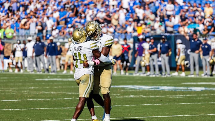 Oct 18, 2025; Durham, North Carolina, USA;  Georgia Tech Yellow Jackets linebacker Tah'J Butler (15) celebrates with  defensive back Jy Gilmore (14) during the second half of the game against Duke Blue Devils at Wallace Wade Stadium. Mandatory Credit: Jaylynn Nash-Imagn Images