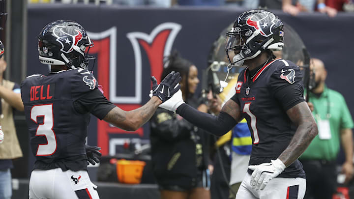 Oct 27, 2024; Houston, Texas, USA; Houston Texans wide receiver Tank Dell (3) celebrates with wide receiver Stefon Diggs (1) after scoring a touchdown during the second quarter against the Indianapolis Colts at NRG Stadium. Mandatory Credit: Troy Taormina-Imagn Images