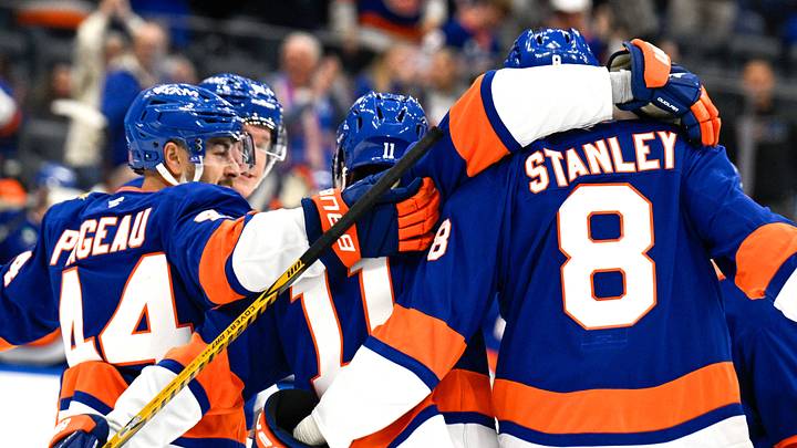 Oct 8, 2026; Elmont, New York, USA; New York Islanders defenseman Logan Stanley (8) and New York Islanders center Jean-Gabriel Pageau (44) celebrate the goal by New York Islanders left wing Anthony Duclair (11) against the Chicago Blackhawks during the second period at UBS Arena. Mandatory Credit: Dennis Schneidler-Imagn Images Oct 8, 2026; Elmont, New York, USA; New York Islanders defenseman Logan Stanley (8) and New York Islanders center Jean-Gabriel Pageau (44) celebrate the goal by New York Islanders left wing Anthony Duclair (11) against the Chicago Blackhawks during the second period at UBS Arena. Mandatory Credit: Dennis Schneidler-Imagn Images