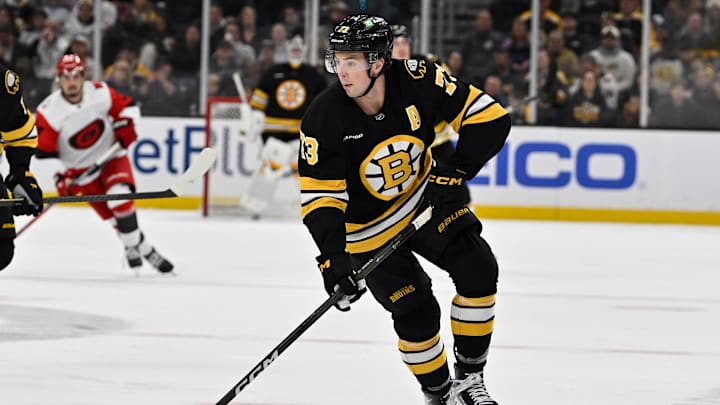 Nov 1, 2025; Boston, Massachusetts, USA; Boston Bruins defenseman Charlie McAvoy (73) skates with the puck during the third period against the Carolina Hurricanes at TD Garden. Mandatory Credit: Eric Canha-Imagn Images Nov 1, 2025; Boston, Massachusetts, USA; Boston Bruins defenseman Charlie McAvoy (73) skates with the puck during the third period against the Carolina Hurricanes at TD Garden. Mandatory Credit: Eric Canha-Imagn Images
