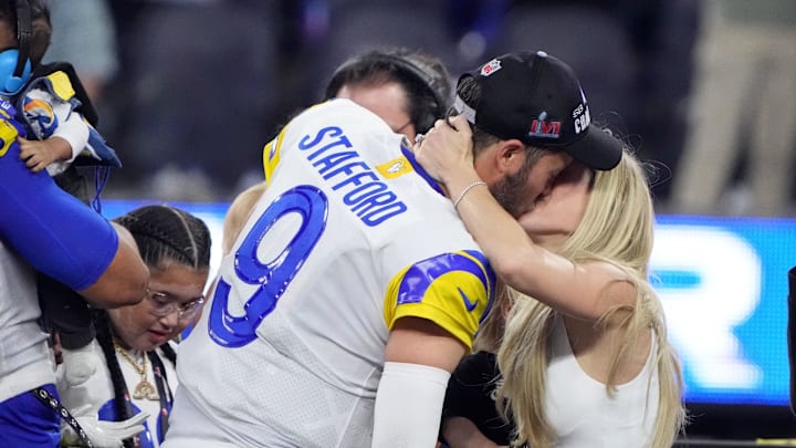 Los Angeles Rams quarterback Matthew Stafford (9) celebrates with his wife Kelly Stafford after defeating the Cincinnati Bengals in Super Bowl LVI at SoFi Stadium. Mandatory Credit: Kirby Lee-Imagn Images