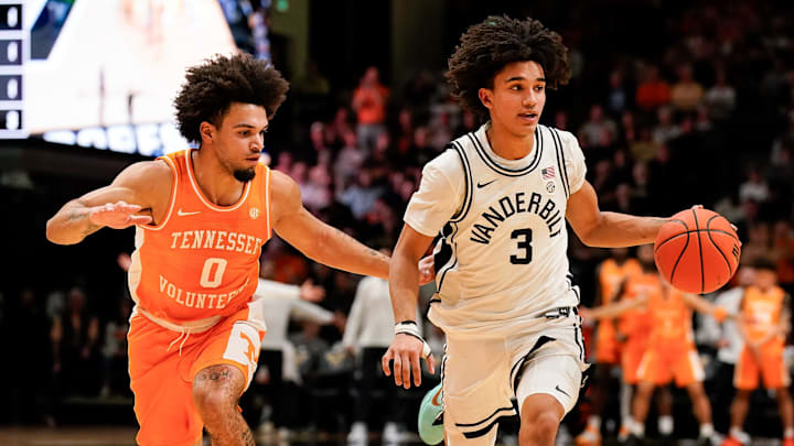 Vanderbilt guard Tyler Tanner (3) moves the ball past Tennessee guard Ja'kobi Gillespie (0) during the second half at Memorial Gym in Nashville, Tenn., Saturday, Feb. 21, 2026.