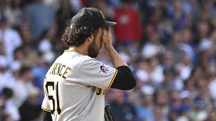 Apr 12, 2026; Chicago, Illinois, USA;  Pittsburgh Pirates pitcher Justin Lawrence (61) after the Chicago Cubs score during the eighth inning at Wrigley Field. Mandatory Credit: Matt Marton-Imagn Images