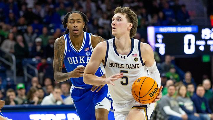 Feb 24, 2026; South Bend, Indiana, USA; Notre Dame Fighting Irish guard Cole Certa (5) drives to the basket against the Duke Blue Devils during the first half at Purcell Pavilion at the Joyce Center. Mandatory Credit: Michael Caterina-Imagn Images Feb 24, 2026; South Bend, Indiana, USA; Notre Dame Fighting Irish guard Cole Certa (5) drives to the basket against the Duke Blue Devils during the first half at Purcell Pavilion at the Joyce Center. Mandatory Credit: Michael Caterina-Imagn Images