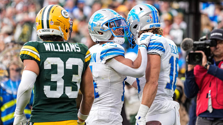 Detroit Lions wide receiver Isaac TeSlaa (18) celebrates his touchdown against Green Bay Packers with wide receiver Amon-Ra St. Brown (14) during the second half at Lambeau Field in Green Bay, Wis., on Sunday, September 7, 2025.