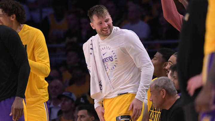 Feb 10, 2025; Los Angeles, California, USA; Los Angeles Lakers guard Luka Doncic (77) on the bench in the second half against the Utah Jazz at Crypto.com Arena. Mandatory Credit: Jayne Kamin-Oncea-Imagn Images