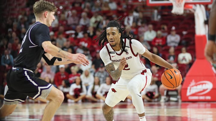 Nov 6, 2024; Fayetteville, Arkansas, USA; Arkansas Razorbacks guard Boogie Fland (2) drives against Lipscomb Bisons guard Joe Anderson (22) in the second half at Bud Walton Arena. Arkansas won 76-60. Mandatory Credit: Nelson Chenault-Imagn Images Nov 6, 2024; Fayetteville, Arkansas, USA; Arkansas Razorbacks guard Boogie Fland (2) drives against Lipscomb Bisons guard Joe Anderson (22) in the second half at Bud Walton Arena. Arkansas won 76-60. Mandatory Credit: Nelson Chenault-Imagn Images