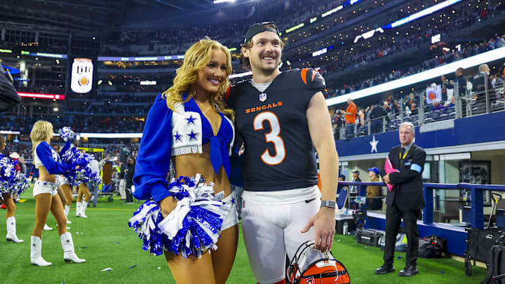 Cincinnati Bengals kicker Cade York (3) takes a photo with his Dallas Cowboys cheerleader girlfriend Zoe Dale after the game against the Dallas Cowboys.