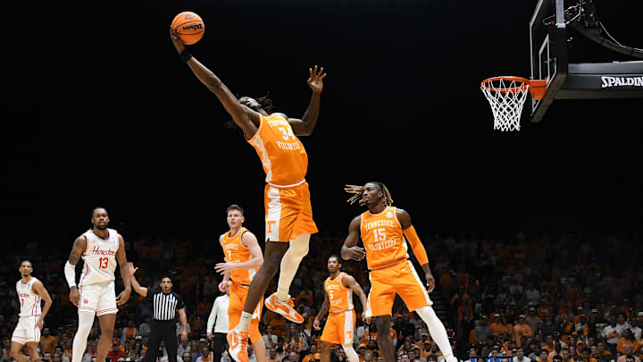 Mar 30, 2025; Indianapolis, IN, USA; Tennessee Volunteers forward Felix Okpara (34) grabs a rebound against the Houston Cougars in the second half during the Midwest Regional final of the 2025 NCAA tournament at Lucas Oil Stadium. Mandatory Credit: Robert Goddin-Imagn Images