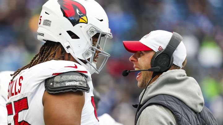 Nov 24, 2024; Seattle, Washington, USA; Arizona Cardinals head coach Jonathan Gannon talks with defensive tackle Dante Stills (55) during the second quarter against the Seattle Seahawks at Lumen Field. Mandatory Credit: Joe Nicholson-Imagn Images