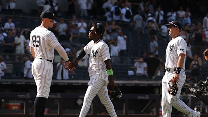 Jun 29, 2025; Bronx, New York, USA; New York Yankees designated hitter Aaron Judge (99) celebrates with New York Yankees second base Jazz Chisholm Jr. (13) after defeating the Athletics at Yankee Stadium. Mandatory Credit: Vincent Carchietta-Imagn Images