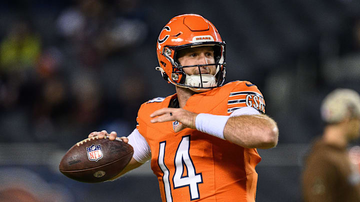 Nov 9, 2023; Chicago, Illinois, USA; Chicago Bears quarterback Nathan Peterman (14) warms up before a game against the Carolina Panthers at Soldier Field. Mandatory Credit: Daniel Bartel-Imagn Images