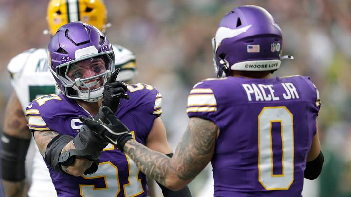 Minnesota Vikings linebacker Blake Cashman (51) celebrates with linebacker Ivan Pace Jr. (0) after sacking Green Bay Packers quarterback Clayton Tune (6) during their football game Sunday, January 4, 2026, at U.S. Bank Stadium in Minneapolis, Minnesota.