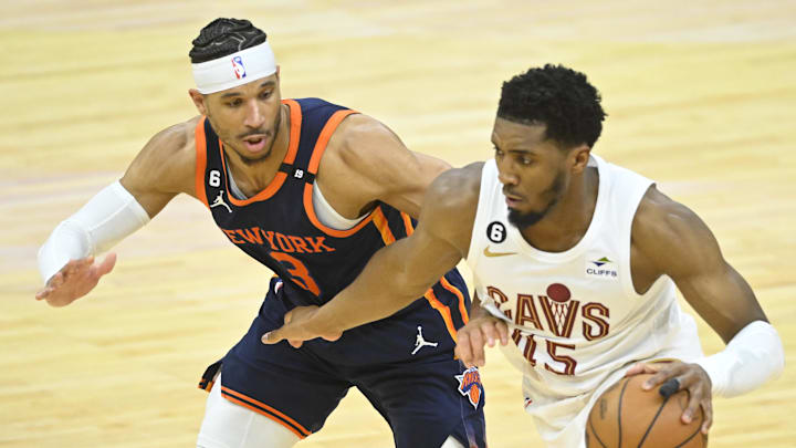 Apr 26, 2023; Cleveland, Ohio, USA; New York Knicks guard Josh Hart (3) defends Cleveland Cavaliers guard Donovan Mitchell (45) in the fourth quarter during game five of the 2023 NBA playoffs at Rocket Mortgage FieldHouse. Mandatory Credit: David Richard-Imagn Images