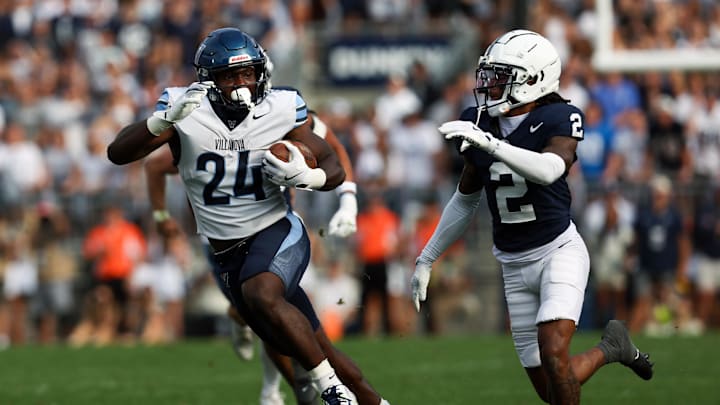 Sep 13, 2025; University Park, Pennsylvania, USA; Villanova Wildcats running back David Avit (24) runs with the ball during the second quarter against the Penn State Nittany Lions at Beaver Stadium. Mandatory Credit: Matthew O'Haren-Imagn Images